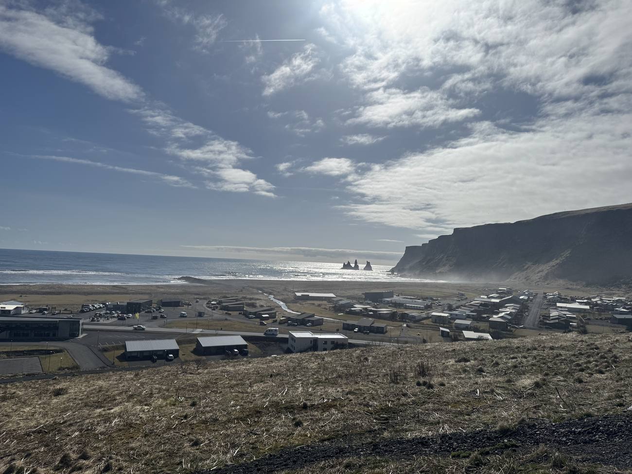 The village of Vík and its black beach seen from the hillside